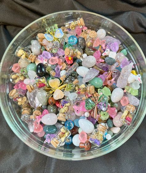 Ostara/ Spring Witch's Brew Crystal Confetti. Our Brew is filled with so many beautiful treasures!  What's in the mix?  Crystal Eggs Daisy Charms Mini Mushrooms Herb and Flower Jars  Raw Amethyst Points   Moss Agate Tumbles Green Aventurine Mini Tumbles  Lapis Lazuli Chips Moss Agate Tumbles Green Aventurine mini Spheres Rose Quartz Mini Spheres Howlite Mini Spheres Tiger's Eye Mini Spheres Mini Bottles filled with lavender  Moonstone Chips Butterflies Resin Bunnies Small Howlite Tumbles Tiger's Witchs Brew, Spring Witch, Flower Jars, Crystal Confetti, Minerals Crystals Rocks, Flowers In Jars, Crystal Egg, Witch's Brew, Daisy Charm