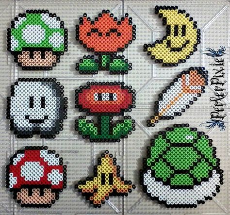 Here are some Mario themed perlers! The perlers are as follows. ~1-UP Mushroom ~Fire Flower ~Moon ~Cloud ~Fire Flower 2 ~Feather ~Super Mushroom ~Banana ~Koopa Shell Perler Bead Mario, Easy Perler Bead Patterns, Perler Creations, Melty Bead Patterns, Pearl Beads Pattern, Art Perle, Flower Moon, 8bit Art, Hama Beads Design