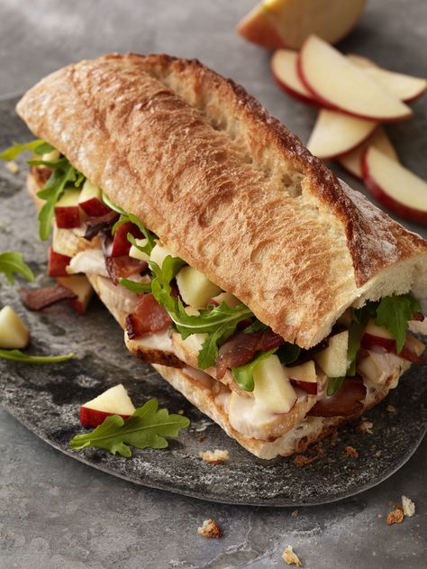 Turkey, Bacon & Apple Sandwich is perfect for anyone who loves apples and BLTs. This sandwich features crisp apple slices, applewood-smoked bacon, and Panera® Fuji Apple Vinaigrette Dressing. Apple Vinaigrette Dressing, Apple Salad Dressing, Apple Vinaigrette, Turkey Apple, Apple Sandwich, Blt Sandwich, Fuji Apple, Crisp Apple, Copycat Restaurant Recipes