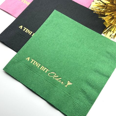 A Tini Bit Older Cocktail Napkin.  These napkins are perfect for a martini themed birthday party or as a gift for someone who loves martinis. Perfect for both him and her, these napkins serve as ideal decorations for a memorable Birthday Party. Crafted through a meticulous hot foil stamping process, these 3-ply 5x5 inch beverage napkins exude quality and vibrancy, making them the perfect addition to your birthday table decor. Key Features: Hot Foil Stamping: Our napkins are created through a hot foil stamping process, ensuring a high-quality and visually appealing design that stands out at the party. Variety of Colors: Choose from different colors of napkins and foils to match your party theme. Personalize your set with Gold, Rose Gold, or Silver foil accents. 3-Ply Beverage Napkins: These Chic Birthday Decorations, A Toni Bit Older, A Tiny Bit Older Party Theme, Apartment Party Ideas, Martini Themed Birthday Party, Martini Party Ideas Decoration, Tini Bit Older Bday Theme, Tini Birthday, Tini Bit Older Decor