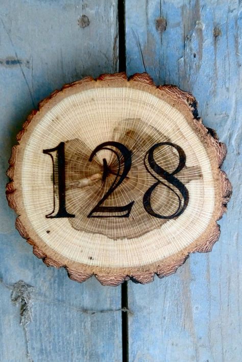 Items similar to Rustic House number sign, wooden address plaque, custom housewarming gift, personalized tree slice, outdoor house numbers, wood yard decor on Etsy Rustic Front Porch Decor, Rustic House Numbers, Rustic Front Porch, Porch Wall Decor, Custom Housewarming Gift, Number Ideas, Home Wooden Signs, House Plaques, Wooden Numbers