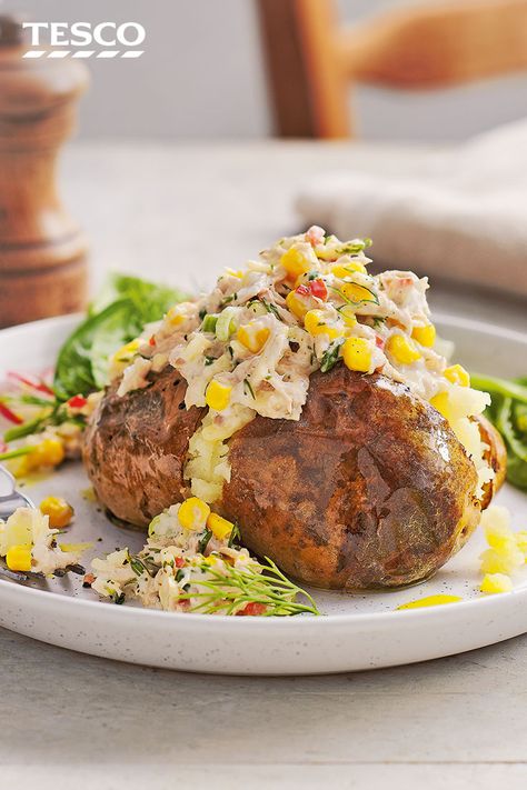 A jacket potato is a classic easy dinner – make it extra filling with this easy tuna and sweetcorn jacket potatoes. Add some heat to the tuna filling with chillies, horseradish and spring onions and serve with a crisp green salad. | Tesco Baked Potato Fillings, Tuna And Sweetcorn, Tuna Healthy, Jacket Potato Recipe, Jacket Potatoes, Healthy Dinner Ideas, Potato Dinner, Tesco Real Food, Jacket Potato