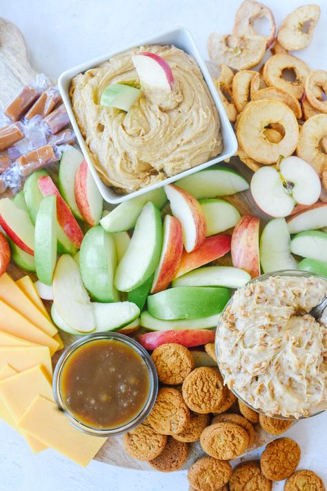 School's back and this Fall Snack Board is full of apple and caramel goodness.  It's the perfect way to welcome the kiddos home from school or to welcome your guests to any fall holiday parties you may be hosting or attending. #cheeseboard #snackboard #apples #cheese #caramel #charcuterie #easy #traderjoes #howtomakea #wooden #simple #fall Apple Slice Charcuterie, Apples Charcuterie Board, Apple And Cheese Charcuterie Board, Apple And Cheese Board, Halloween Charcuterie Board Carmel Apple, Apple Cheese Board, Fall Apple Charcuterie Board, Caramel Charcuterie Board, Fall Snack Platter