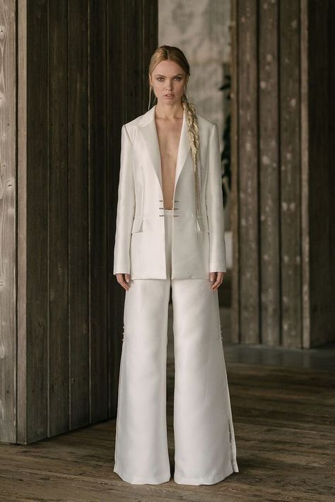 The Bridal Power Suit Is Here: 13 Jumpsuits & Pantsuits That Are Strong AF - We’ve seen the bridal pantsuit and jumpsuit trend pop up before, but this year it feels like these power suits are going to be taking over the ceremony aisles. plunge, blazer, palazzo pants {Rivini by Rita Vinieris} Cape Dress Long, Wedding Suits For Bride, Bridal Pantsuit, Rita Vinieris, Wedding Pants, Women Suits Wedding, Bridal Jumpsuit, White Suit, Wedding Dresses Satin