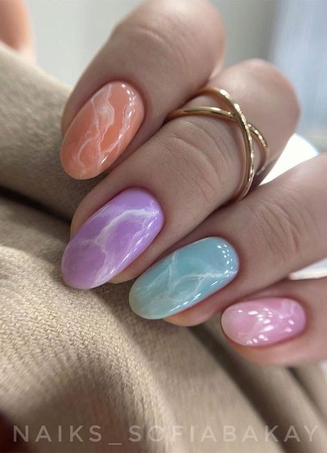 33. Pastel Marble nails A beautiful mixed pastel nail set. As spring is on the way, so if you’re looking for spring nails then... Marble Nails Pastel, Marble Spring Nails, Marble Pastel Nails, Pastel Marble Nail Art, Nail Marble Designs, Cute Nails Pastel, Matte Pastel Nails, Spring Marble Nails, Trendy Pastel Nails