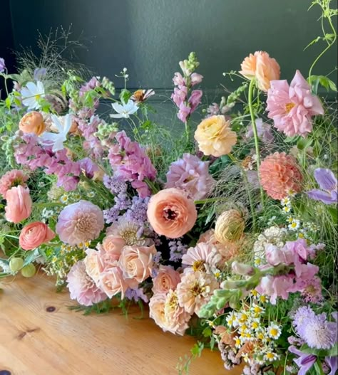 Pretty loose florals - pastel colors Pastel Color Theme Party, Pastel Colors Bouquet, Colourful Pastel Wedding Flowers, Pastel Rainbow Flowers, Enchanted Garden Wedding Flowers, Pastel Prom Decorations, Yellow Pink Purple Wedding, Pastel Rainbow Flower Arrangements, Pastel Outdoor Wedding