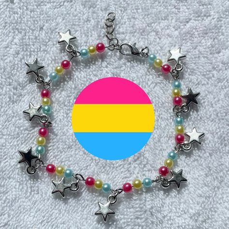 🩷💛💙Pan Bracelet💙💛🩷 • • DM To Order • • Tags #smallbusiness #handmade #bracelet #bracelets #beaded #beadedjewelry #explore #cutejewlery #pink #yellow #blue #customjewlery #madetoorder #star #handmadejewelry #cute #hispanic #hispanicowned #pulseras #summer #summerjewelry #june #pride #gay #pan #pansexual Pansexual Jewelry, Pansexual Bracelet, Pan Bracelet, Bracelets Beaded, Handmade Bracelet, Summer Jewelry, Yellow Blue, Pink Yellow, Beaded Jewelry