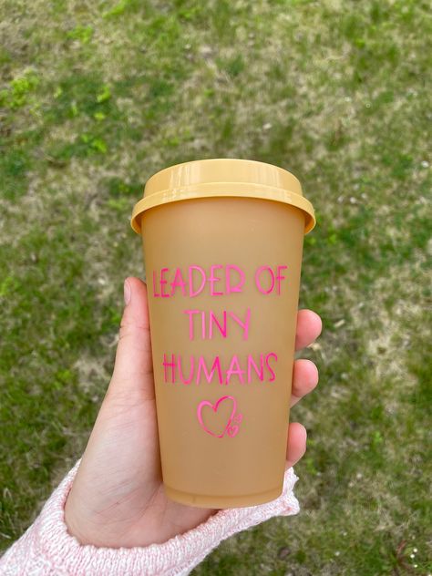 "\"Leader of Tiny Humans\" tumbler. Made on a color changing cup. Can be made on a hot cup, cold cup, color changing cold cup, or original Starbucks cold cup. Perfect gift for teacher appreciation week, therapists, guidance counselors, principals, etc. Can customize and add a name above the text as well! For example \"Mrs. Smith, Leader of Tiny Humans\"" Tumbler For Teacher, Appreciation Gifts Diy, Teacher Appreciation Gifts Diy, Teacher Appreciation Week, Tiny Humans, Cold Cup, Appreciation Gifts, Gifts Diy, Teacher Appreciation Gifts