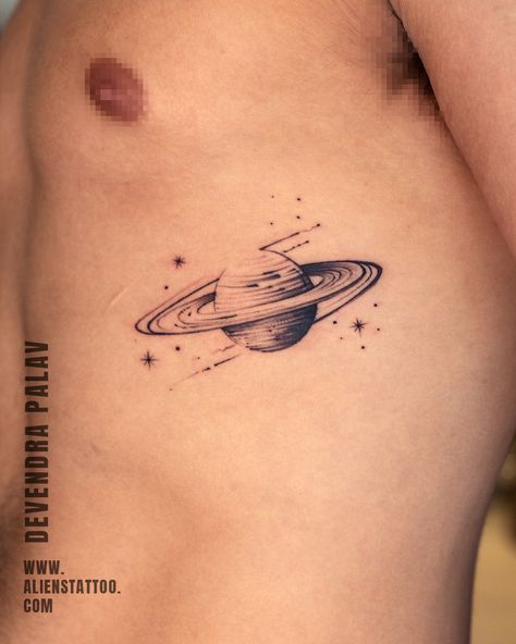 Creative Small Tattoos For Men, Small Space Tattoo Ideas For Men, Minimalistic Tattoo Ideas For Men, Unique Saturn Tattoo, Mini Saturn Tattoo, Tattoo Ideas Minimalist Men, Planet Hand Tattoo, Planet Tattoos Men, Space Tattoo Minimalist