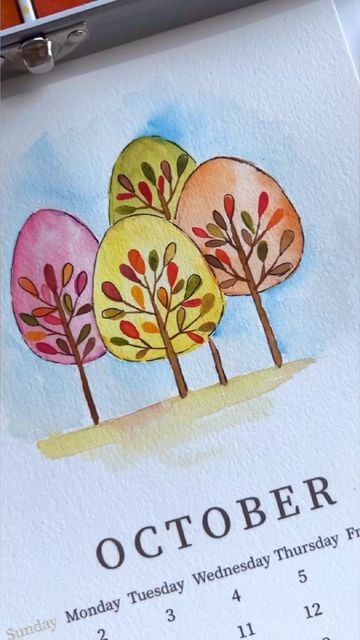 Seema on Instagram: "Whimsical autumn trees on a watercolor calendar 2023 @grabieofficial #reelsinstagram #reels #reelsvideo #réel #letsgrabie #summervibes #october #artistsoninstagram #watercolorpainting #watercolorillustration #watercolorartist #january #2023 #watercolordaily #watercolorplanet #watercolor_painting #paintingoftheday #paintingprocess #arttutorial #calendar #holidayhappinessseries" November Watercolor Ideas, September Watercolor, Whimsical Autumn, Watercolor Calendar, October Art, Calendar 2023, Watercolor Projects, January 2023, October 27