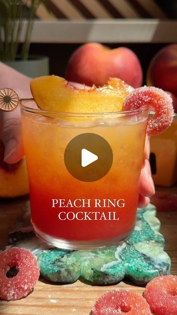 Lexi Harrison & Beth Sinclair on Instagram: "Peach Ring Cocktail 🍑🛟 Recipe below 👇

We’ve been testing a recipe for homemade gummy peach rings (coming soon!!) and it inspired us to make it into cocktail form! 

It’s super easy to make with fresh peach purée, lemon juice, vodka, peach schnapps and grenadine for the red layer. It’s sweet, tart, refreshing and perfect for a summer Friday 🥂

Bookmark the recipe below 👇 and tag us if you make it!! 

Peach Ring Cocktail (makes 1) 

Ingredients: 

2 oz fresh peach purée (1/2 of a large peach)
1/2 oz freshly squeezed lemon juice
1 1/2 oz vodka 
1/2 oz peach schnapps 
1/4-1/2 oz grenadine 

Add the peach(es) to a blender or food processor and blend until smooth. Optional: strain through a fine mesh sieve. (Alternatively, you can peel the peach Peach Ring Cocktail, Peach Ring Drink, Drinks With Peach Vodka, Peach Ring Alcoholic Drink, Drinks Made With Peach Schnapps, Cocktails With Peach Schnapps, Peach Whisky Cocktails, Peach Ring, Fruity Alcohol Drinks