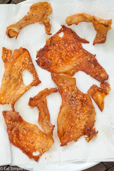 This oven roasted chicken skin (AKA cracklings) recipe makes a great snack.  The drier the chicken skin, the more crispy it will be. Baked Chicken Skin, How To Make Chicken Skin Crispy, Fried Chicken Skins Easy Recipes, Air Fryer Chicken Skin, Crispy Chicken Skin In Oven, Fried Chicken Skins, Crispy Chicken Skin Recipes, Fried Chicken Skin Recipe, Chicken Crackling Recipe