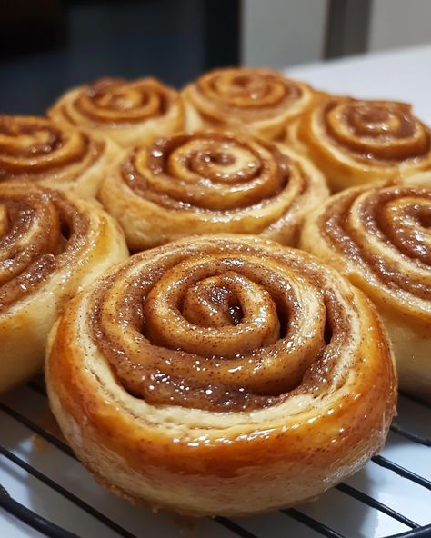 Banana Bread Cinnamon Rolls These banana bread cinnamon rolls combine the soft, comforting flavors of banana bread with the rich, gooey goodness of cinnamon rolls. Perfect for breakfast, brunch, or a sweet treat anytime! Ingredients: For the dough: - 3 cups all-purpose flour - 1/4 cup granulated sugar - 1 package (2 1/4 teaspoons) active dry yeast - 1/2 teaspoon salt - 1/2 cup milk, warmed - 1/4 cup unsalted butter, melted - 1/2 cup mashed ripe bananas (about 1 large banana) - 1 egg For t... Banana Bread Cinnamon Rolls, Banana Bread Cinnamon, Bread Cinnamon Rolls, Bread Cinnamon, Active Dry Yeast, Homemade Pastries, Ripe Bananas, Winter Vibes, Ripe Banana