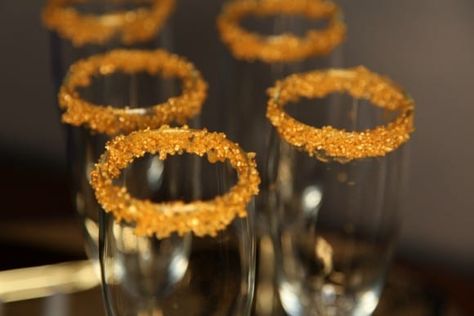 Sugar-Rimmed Champagne Glass DIY | Catch My Party Sugar Glass, Colored Sugar, Champagne Party, Glass Diy, Fruit Decorations, Welcome Drink, Party Diy, Holiday Drinks, Champagne Glasses