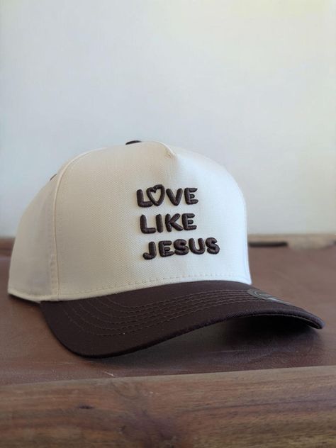 This super trendy trucker hat is embroidered with LOVE LIKE JESUS.  Your hat will be embroidered with a thread color that will match the bill of the hat! Thank you for your interest and may God bless you and your family!! -The Kendalls Love Like Jesus, 3d Embroidery, God Bless You, Trucker Cap, God Bless, Caps Hats, Trucker Hat, Accessories Hats, With Love