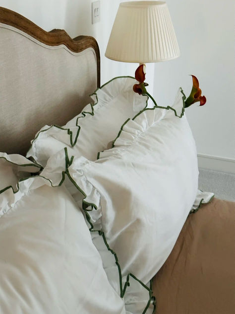 For south of France summers. This luxe pillow case set is ethically crafted from premium cotton sateen. Featuring a classic bone shade and olive ruffled frill trim. Personalise for an elevated housewarming gift.Makers of luxurious bedding, Sukun is dedicated to elevating the art of rest and relaxation. Inspired by boutique hotel stays and dreamy holiday destinations, they are sustainably designed and ethically crafted for tasteful and considered gifting. Pillow Case Design Ideas, Luxe Bedding, Ruffle Pillow Case, Bed Idea, Minimal Bedroom, Full Bedding Sets, Room Redesign, Green Bedroom, Ruffle Bedding