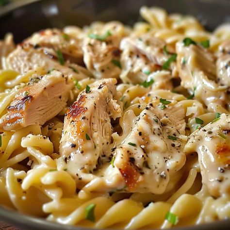 Creamy, flavorful Garlic Parmesan Chicken Pasta made effortlessly in your slow cooker. Perfect for a comforting, weeknight meal. White Cheddar Chicken Pasta, White Cheddar Pasta, Cheddar Chicken Pasta, Chicken Cheesecake, Garlic Parmesan Chicken Pasta, Parmesan Chicken Pasta, Garlic Chicken Pasta, Garlic Parmesan Sauce, Chicken Parmesan Pasta