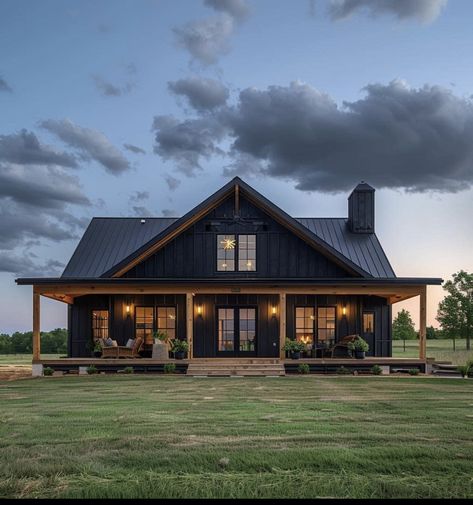 Home Build Exterior, Kitchen With Black Countertops And Wood Cabinets, Farmhouse With Metal Siding, Dark Grey House Black Windows, Black Farmhouse With Wrap Around Porch, Black House Black Roof, One And A Half Story Barndominium, Black House With Porch, Black Barndominium Exterior Modern