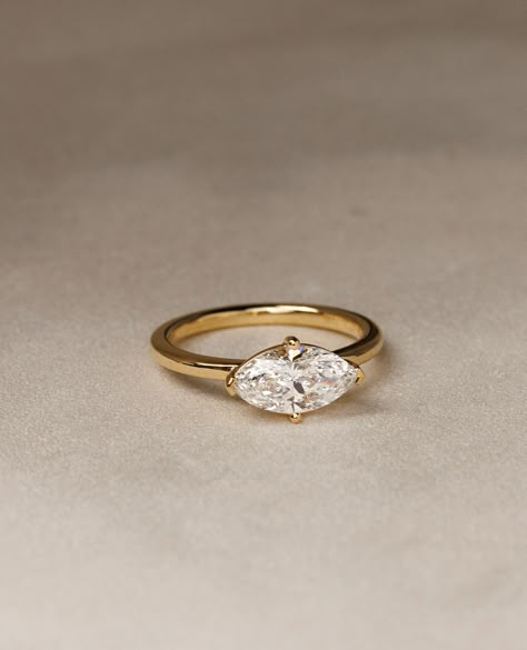 ✨East-West Marquise Solitaire✨⁠ ⁠ An east-west engagement ring is a distinctive design in which the gemstone is set horizontally across the band rather than in the traditional vertical (North-South) orientation. ⁠ ⁠ We're kinda obsessed!⁠ ⁠ Details:⁠ River - East West Marquise Solitaire 1.51ct | E | VS1⁠ ⁠ Vertical Diamond Ring, Vertical Engagement Ring, East West Moissanite Engagement Ring, Marquise Engagement Ring East West, Marquise Diamond Ring East West, East West Setting Engagement Ring, Horizontal Marquise Ring, Horizontal Set Engagement Ring, Marquise East West Engagement Ring