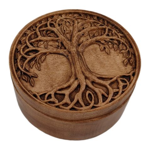 This round tree of life box is carved from solid maple. The box is a perfect size for small treasures, little keepsakes and jewelry items like rings and earrings. This could also be a very unique box for a marriage proposal or ring bearer boxes.The box measures 3" x 3" x approximately 1.75".You can personalize it with an engraving of your choice under the lid (100 characters or less).Free shipping for US customers.All pieces are made to order. Natural characteristics of wood, distressing, and fi Lord Of The Rings Wood Carving, Tree Of Life Carving, Ring Bearer Boxes, Celtic Decor, Bandsaw Box, Small Wooden Boxes, Laser Ideas, Celtic Culture, Ring Bearer Box