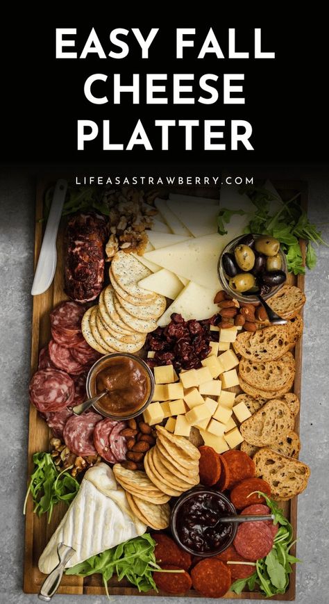 This simple fall-inspired cheese board is tailor made for Thanksgiving or Friendsgiving celebrations! Use this step by step tutorial (with photos at every stage of the process!) to build an amazing cheese plate for your holiday gathering. Includes plenty of ideas to help you customize the cheeses and other ingredients! This board features brie, white cheddar, goat cheese, and manchego - but we've included plenty of notes to help you make delicious substitutions! With step by step photos. Build A Cheese Board, Thanksgiving Cheese Board, Thanksgiving Cheese Boards, Water Crackers, Marinated Olives, Charcuterie And Cheese Board, Cheese Tray, Fig Jam, Milk And Cheese