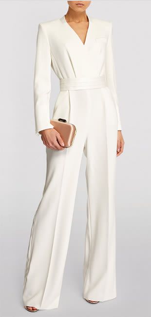 14 best bridal jumpsuits for your 2023 wedding: From ASOS to Net-a-Porter | HELLO! White Jumpsuit Modest, Beige Jumpsuit Outfit Wedding, White Bridal Pantsuit, Jumpsuit Women Elegant, Silk Jumpsuit Wedding, White Wedding Pantsuit, Bridal Pantsuit Brides, Bridal Jumpsuit The Bride, Jumpsuit Elegant Wedding