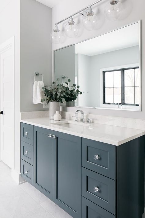 37 Best Blue Gray Colors for Cabinets in Kitchen and Bathrooms Best Color For Bathroom Cabinets, Slate Blue Bathroom Cabinets, Farmhouse Bathroom Cabinet Colors, Bathroom Cabinet Paint Colors Vanities, Blue Bathroom Vanity Paint Color, Blue Gray Bathroom Vanity, Slate Blue Bathroom Vanity, Charcoal Blue Bathroom, Painted Bathroom Vanity Colors