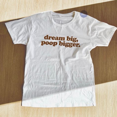 Dream Big, Poop Bigger TShirt is a funny statement tee to wear when you're suffering from IBS, diarrhea or you just generally love to poop. This funny t shirt will surely make everyone laugh or get you weird looks wherever you go. Wear this meme shirt in your school, at the park, on your daily strolls and wait for everyone to laugh at your motivational weird shirt! This poop shirt can also be a funny gift or weird gift for anyone you know who loves pooping as this funny motivational shirt is uni Sean Leonard, Silly Clothes, Silly Shirt, Funky Shirts, Funny Gifts For Her, Funny Statements, Weird Gifts, Weird Shirts, Tshirt Funny