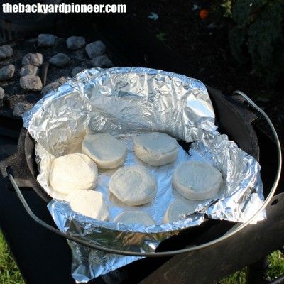 Dutch Oven Biscuits And Gravy Camping, Dutch Oven Biscuits And Gravy, Campfire Biscuits And Gravy, Dutch Oven Biscuits, Campfire Biscuits, Dutch Oven Breakfast, Oven Breakfast, Baking Biscuits, Dutch Oven Camping Recipes