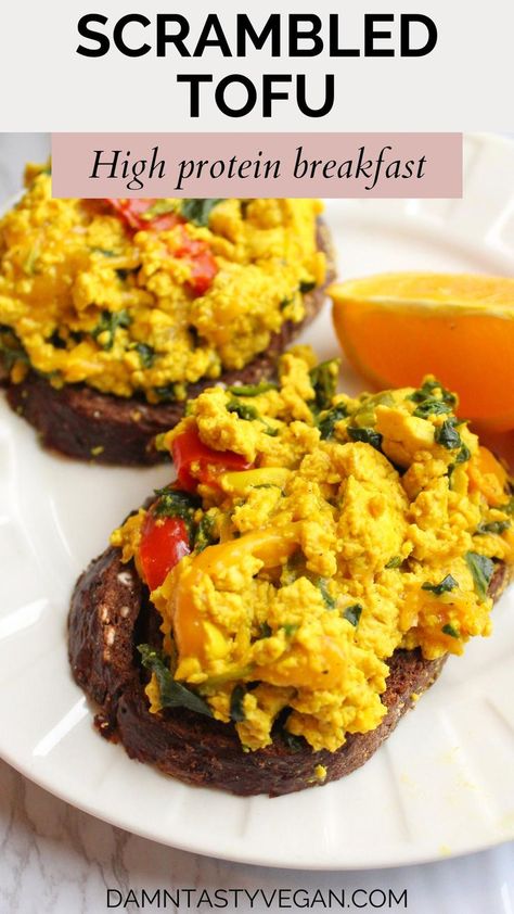 Vegan scrambled tofu on toast next to an orange. Eggs With Veggies, Breakfast Tofu, Vegan Scrambled Eggs, Tofu Scrambled Eggs, Vegan Tofu Scramble, High Protein Vegan Breakfast, Tofu Scramble Vegan, Tofu Breakfast, Vegan Waffles