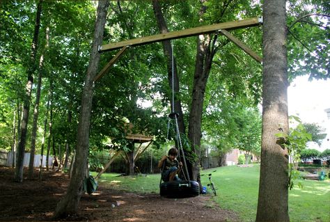 tire swing between two trees -- great idea if you don't have a long sturdy branch to hang it from! Backyard Swing Ideas, Backyard Fort, Diy Swing, Play Area Backyard, Tree House Plans, Tree Fort, Backyard Swings, Tire Swing, Outdoor Play Area