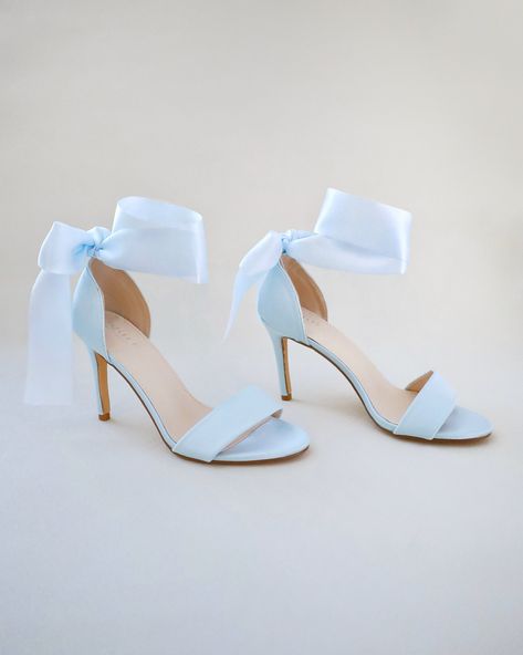 "Classic satin high heel sandals adorned adorned with matching satin or sheer ribbons that ties to an oversized bow around ankle to add dancerly grace to any ensemble. The light blue color can easily be your something blue. Simple and easy wear for bridal wear, bridesmaids, holiday party, wedding parties, and any special occasions.  DETAILS: HEEL HEIGHT: 3.5 Inches COLORS AVAILABLE: Ivory, Light Blue, Champagne, White, Fuchsia UPPER: Synthetic upper and lining MATERIALS: Manmade outsole STYLE NAME: DEMI Not sure of which size to purchase? Shoes measurements are as follow: (Please note measurements taken the length of inside of shoe from toe to heel). Size 6 - 9.25\" Size 7 - 9.5\" Size 8 - 9.75\" Size 9 - 10\" Size 10 - 10.25\" Size 11 - 10.5\" Please note all these info are intended for g Light Blue Party, Blue Champagne, Flower Girl Shoes, Bridal Flats, Wedding Shoes Bride, Satin Shoes, Wedding Guest Shoes, Wedding Sandals, Blue Heels