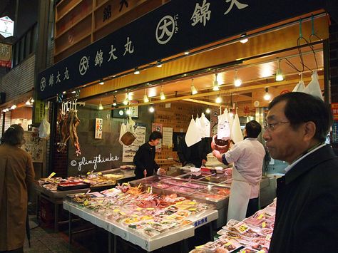 Nishiki Market (錦市場), fondly known as Kyoto’s Kitchen, has been around for more than 400 years. Traditional food vendors, small cooked food shops, and eateries line this 400-metre street. The… Nishiki Market, Cooked Food, Japanese Market, Fresh Seafood, Food Fresh, Food Shop, Traditional Food, No Cook Meals, Kyoto