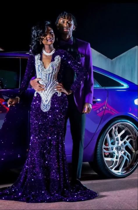 Creative Prom Outfits, Ball Dress With Sneakers, Purple Couple Prom Outfits, Blue Prom Dress Black Couple, Prom Dresses Purple And Black, Prom 2022 Black Couples, Royal Purple Prom Dress Couple, Dark Purple Prom Dress Black Women, Best Prom Colors For Couples