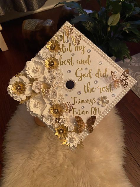 Hi everyone! this graduation cap topper is the perfect addition to your special day! It is made with heavy glitter card stock and permanent vinyl for the text. The paper flowers are all handmade by me and are what make my graduation cap toppers unique and elegant. This cap is made of high quality, durable materials that will keep you sparkling throughout your special day! How to attach to your graduation cap: There are double sided adhesive strips on the back, just peel off the backing and stick God Grad Caps, White Cap Decoration Graduation, Grad Cap Inspo 2024, High School Grad Cap Ideas, Purdue Graduation, Cap Decoration Graduation High School, Girly Graduation Cap, Grad Fits, Cap Decoration Graduation