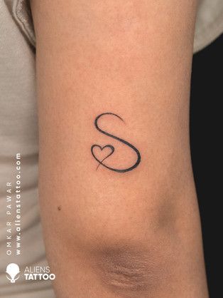 Small S Tattoo, Letter S With Heart, S In Different Fonts, S Heart Tattoo, S Letter Mehndi Design, Letter S Tattoo Ideas, S Initial Tattoo, Small Cute Tattoo Ideas, Small Minimalist Tattoo