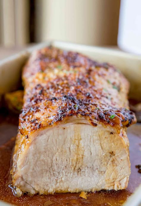 Ultimate Garlic Pork Loin Roast made with just five ingredients, it is easy enough for a weeknight meal and fancy enough for your holiday dinner parties! Garlic Pork Loin, Pork Lion Recipes, Boneless Pork Loin Roast, Pork Loin Roast Recipes, Garlic Pork, Cooking A Roast, Boneless Pork Loin, Pork Roast Recipes, Pork Loin Recipes