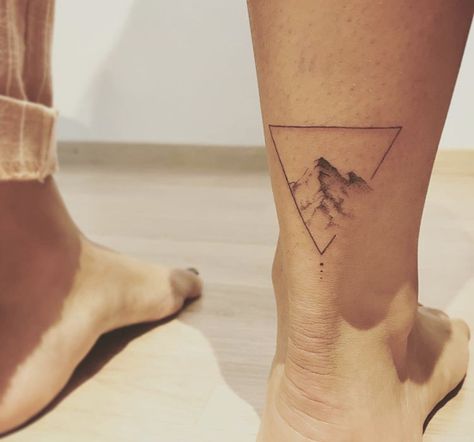 From instagram Ankle Mountain Tattoo, Tattoo Mountain Geometric, Everest Tattoo, Leg Tattoo Placement Ideas, Mountain Lake Tattoo, Moutain Tattoos, Hiking Tattoo, Tattoo Homme, Taurus Tattoos