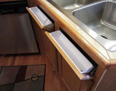 Turn the unusable under-the-sink panels into usable tilt-out storage cubbies! (Rev-A-Shelf tip out tray set- reportedly $18.57 at Lowe's for 2 tray set) How To Make Kitchen Cabinets, Under Kitchen Sink, Storage Cubbies, Hidden Cabinet, Tiny Living Space, Hidden Kitchen, Kitchen Cabinet Drawers, Rev A Shelf, Cubby Storage