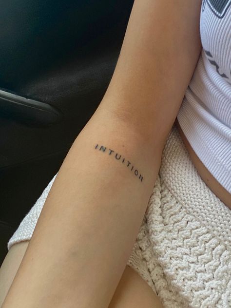 Tattoos For Intuition, Mini Leg Tattoo, Word Tattoos For Women Arm, One Word Forearm Tattoos, One Word Arm Tattoo, Tattoos About Intuition, Worded Tattoos For Women, 1 Word Tattoos For Women, Intuitive Tattoo Ideas