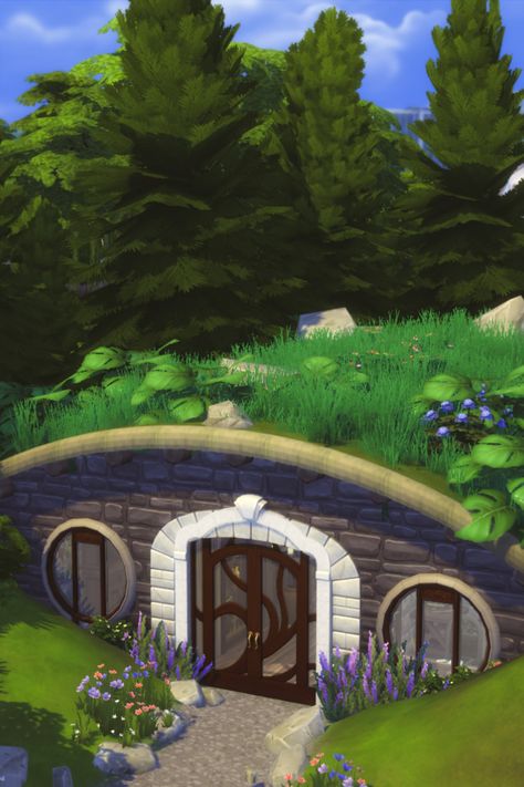 This is an attempt at a #sims4 hobbit house build. It's available in the gallery and fully functional. Hobbit House Plans, Sims 4 House Plans, Hobbit House, Ambient Music, Sims 4 Build, Sims 4 Houses, Sims House, Off Grid, The Sims 4