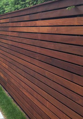 Ipe makes the best material for fencing. Ipe fences are low maintenance, lasts the longest of any hardwoods! https://ipewoods.com/product-category/decking/ipe/ipe-fencing/ Ipe Fence, Horizontal Fence Ideas, Horizontal Wood Fence, Diy Privacy Fence, Wood Fence Design, Fence Boards, Modern Fence Design, Ipe Wood, Privacy Fence Designs