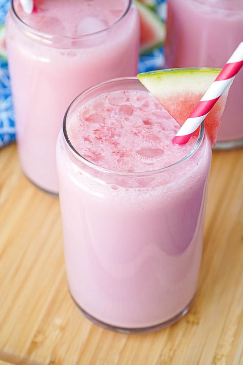 Xigua Niu Nai (Taiwanese Watermelon Milk) in three glasses with ice, watermelon garnish, and red straw. Watermelon Garnish, Watermelon Recipes Drinks, Protein Bottle, Coconut Milk Drink, Watermelon Drink, Milk And Sugar, Milk Smoothie, Sweet Watermelon, Fresh Watermelon