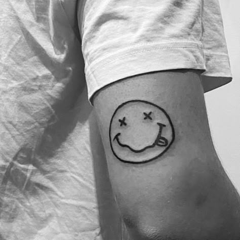 Nirvana Face Tattoo, Small Nirvana Tattoo, Nirvana Smiley Face Tattoo, Kurt Cobain Tattoo Ideas, Nirvana Logo Tattoo, Nirvana Tattoo Lyrics, Grudge Tattoos, System Of A Down Tattoo, Album Cover Tattoo