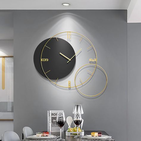 This wall clock is a versatile decor, which is suitable for any background wall. Take iron and wood as materials and combine them with exquisite craftsmanship. The clock with very modern features brings you to experience an artistic time journey and enjoy a simple and comfortable life. You don't need to worry to be disturbed because it comes with original silent scanning movement. It is an elegant wall clock to take your home decor up to a notch. - Material: Metal & Wood- Finish/Color: Gold & Bl Wall Clock Design Ideas, Living Room Wall Clock, Best Wall Clocks, Large Wall Clock Modern, Clock Home Decor, Oversized Clock, Wall Watch, Comfortable Life, Oversized Wall Clock