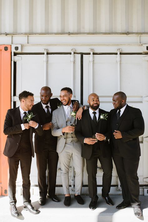 Grey Grooms Suit Wedding, Grey Suit Groom And Groomsmen, Groom In Grey Groomsmen In Black, Gray Groom Black Groomsmen, Grey Groom Suit With Bride, Black And Grey Groomsmen, Grey And Black Wedding Party, Black And Gray Groomsmen Attire, Grey Groom Black Groomsmen