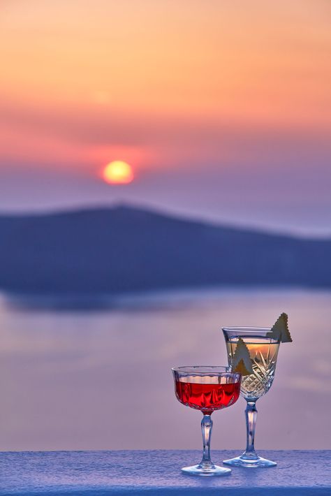 Gold and Crimson...The colors of a ‪#Santorini‬ ‪#‎sunset‬ are simply intoxicating...Cheers everybody! #cocktail #bar #AstraSuites