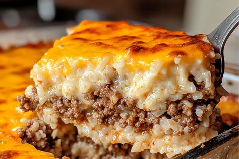 Creamy, cheesy ground beef and rice casserole that’s easy to make, family-friendly, and perfect for weeknight dinners or meal prep. Rice Lasagna Casserole, Beef Rice Casserole Recipes, Cheesy Hamburger Rice Casserole, Rice Hamburger Casserole, Cheesy Ground Beef And Rice Casserole, Ground Beef Rice Casserole, Ground Beef And Rice Casserole, Cheesy Ground Beef And Rice, Beef And Rice Casserole