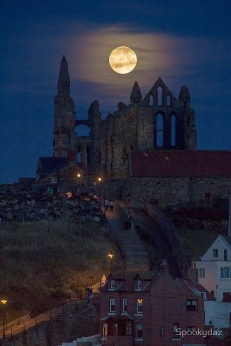 Whitby Abbey was a 7th-century Christian monastery that later became a Benedictine abbey. The abbey church was situated overlooking the North Sea on the East Cliff above Whitby in North Yorkshire, England, a centre of the medieval Northumbrian kingdom. Whitby England, Enchanting Places, Whitby Abbey, Abandoned Castles, Bram Stoker, Moon Rise, Super Moon, Stars At Night, Dark Photography