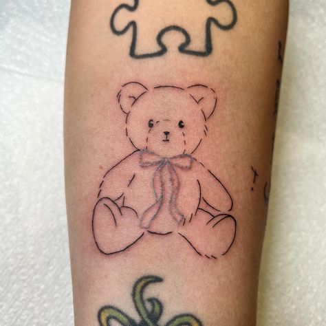 Custom fineline teddy bear with a blue bow 🧸 (Other tats not by me!🩵) Using… @magicmoon_tattoo_supply 5RL @dynamiccolor @worldfamousink @dermalizepro @cheyenne_tattooequipment Based at @outpost_tattoo 🧸🎀 #teddybeartattoo #finelinetattoo #customtattoo #southamptontattoo #femaletattooartist Teddy Bear With Bow Tattoo, Pacifier Tattoo, Bear Tattoos, Bow Tattoo, Teddy Bear Girl, Female Tattoo Artists, Bear Tattoo, Tattoo Supplies, Fine Line Tattoos